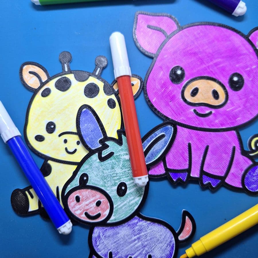 Animal colouring kit pieces coloured with markers