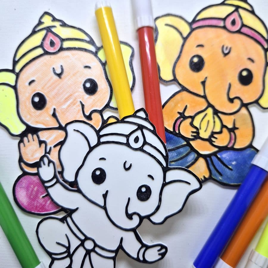 Ganesha painting kit, coloured in, at the Dastaan Studio bench