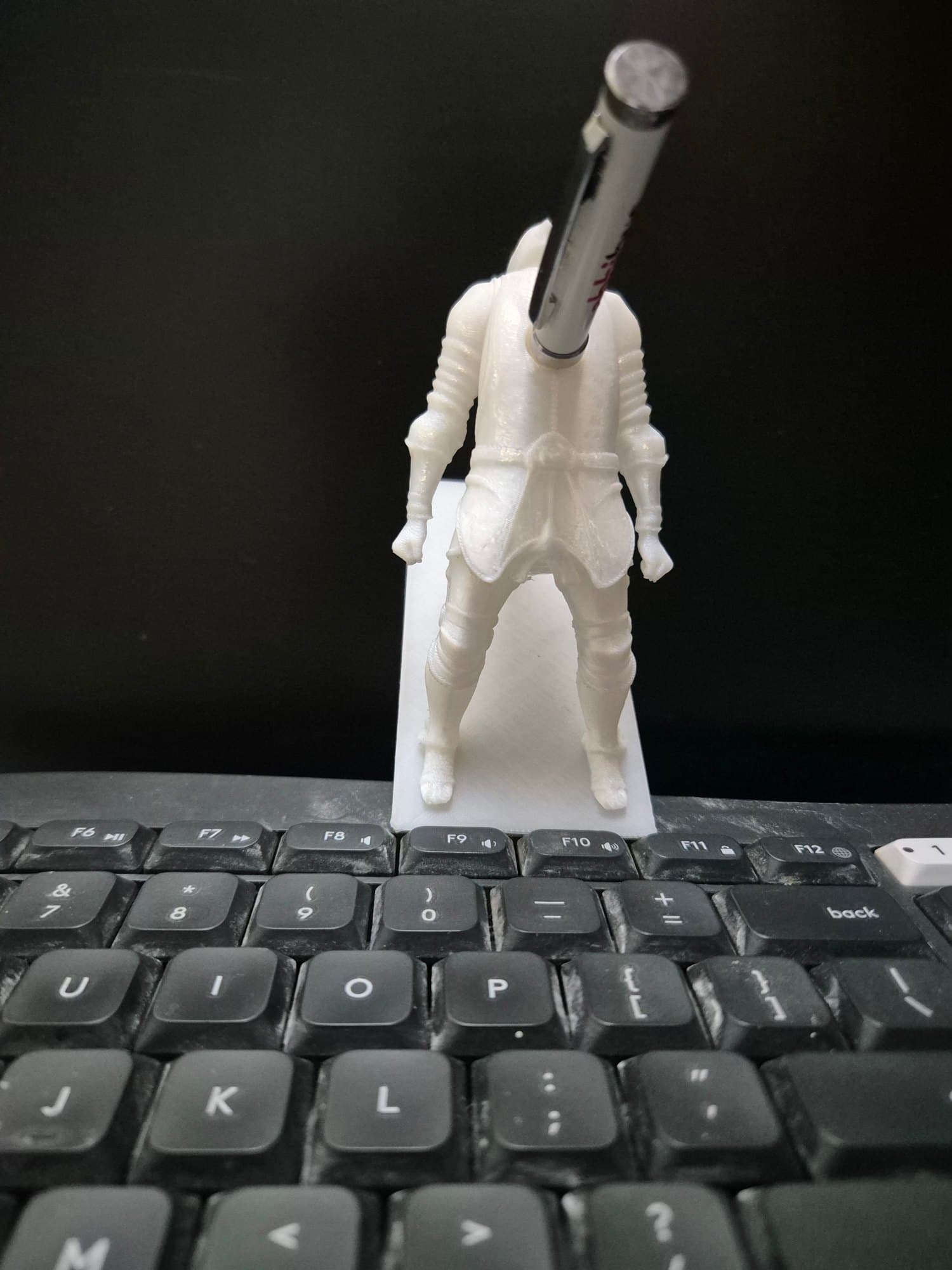 Soldier Pen Holder — lit vs unlit view
