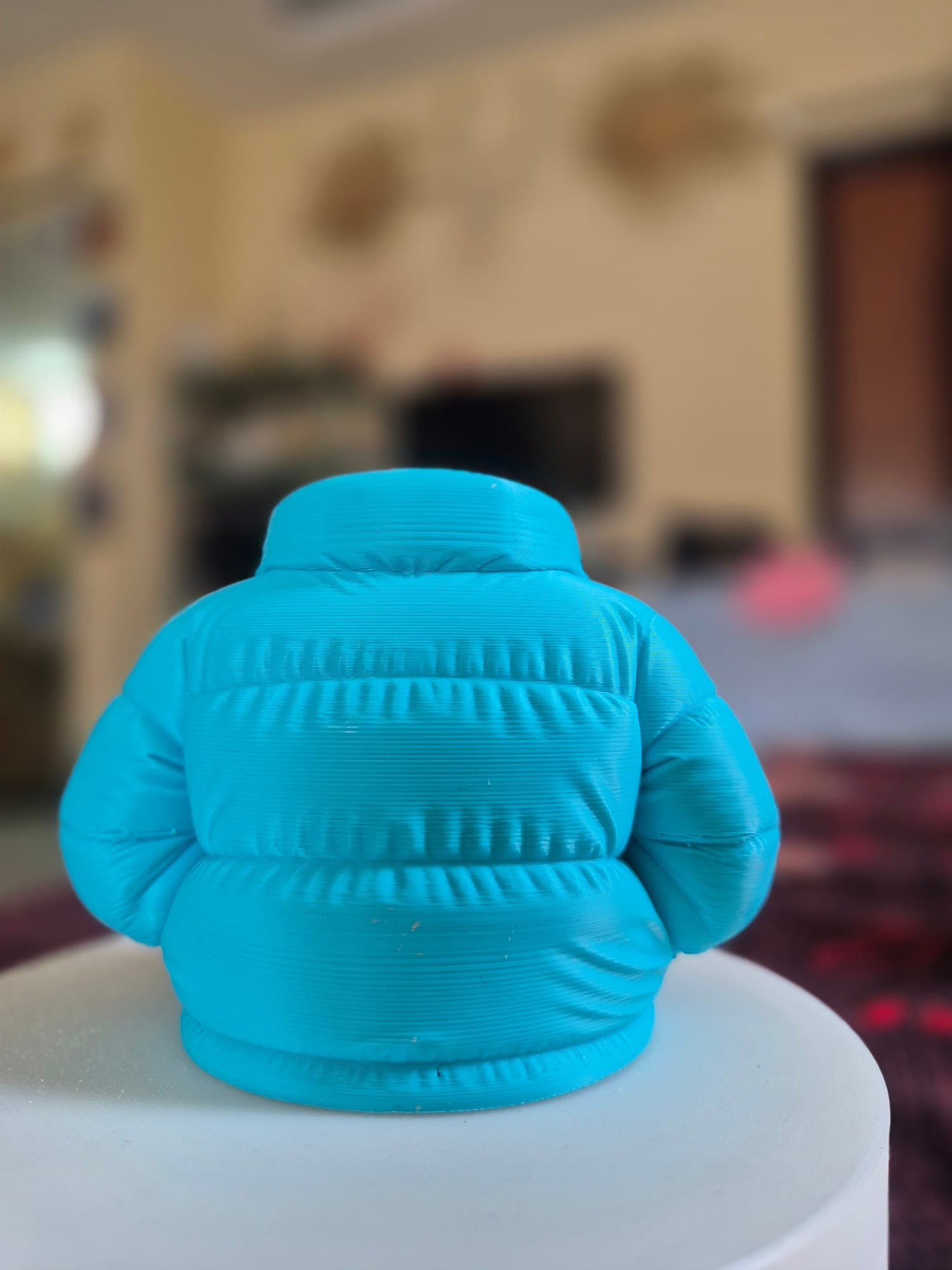 Puffy Jacket Pen Holder — lit vs unlit view