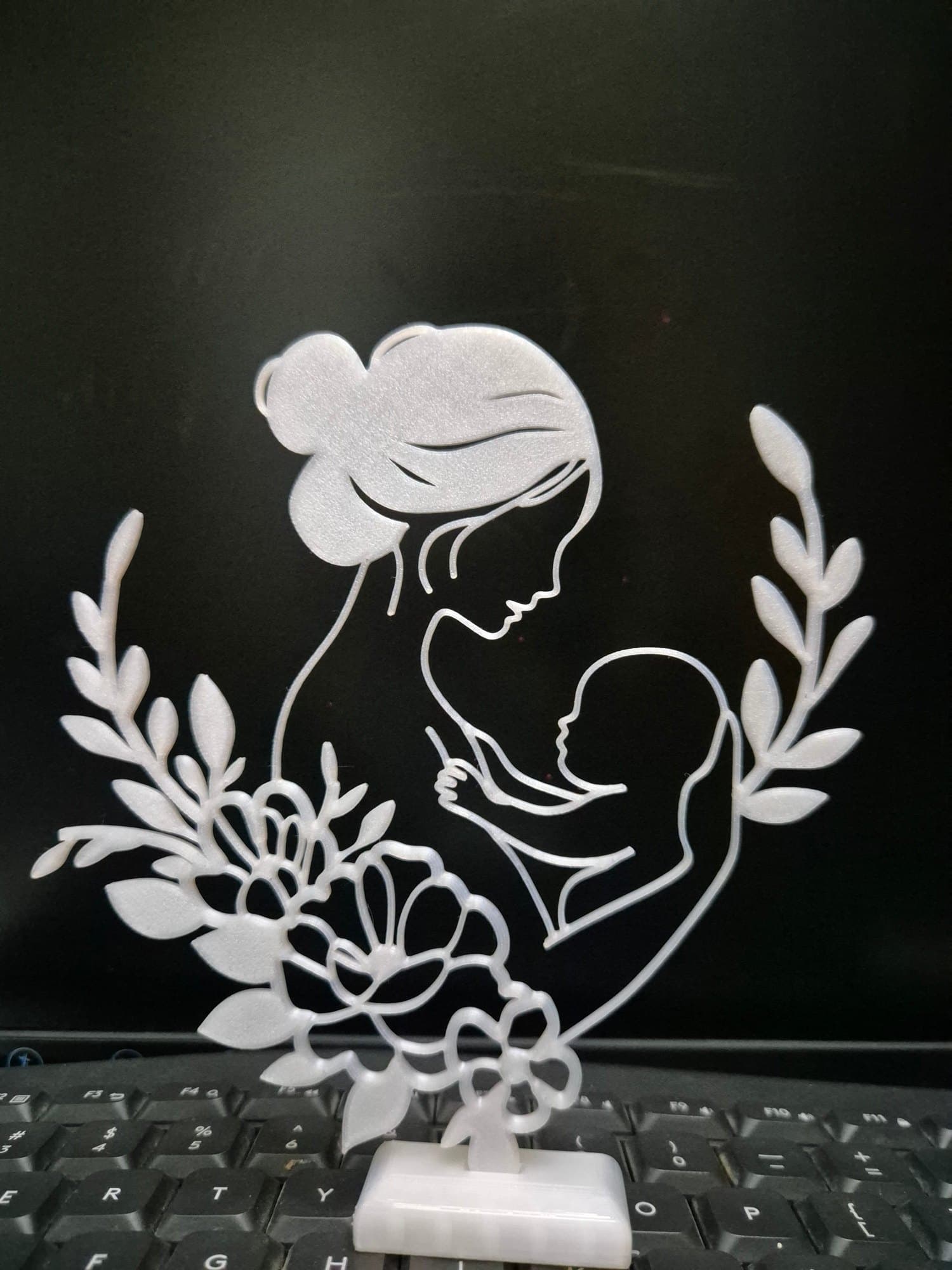 Maa Line Art — 3D Printed Wall Piece — lit vs unlit view
