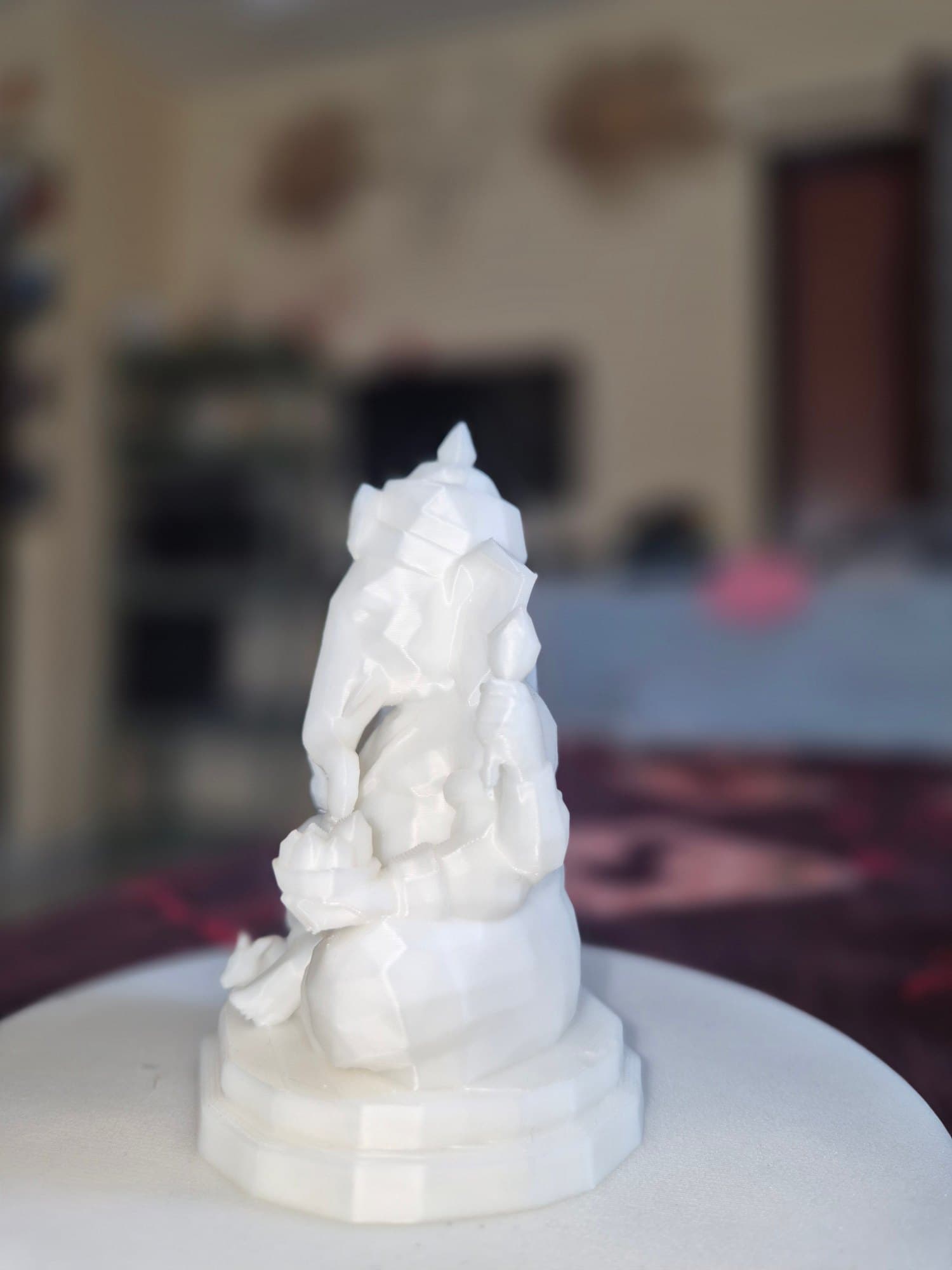 White Paper Fold Ganesh Idol — lit vs unlit view