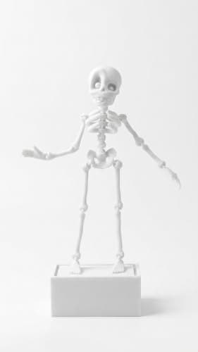 Dancing Skeleton Aquarium Ornament — lit vs unlit view