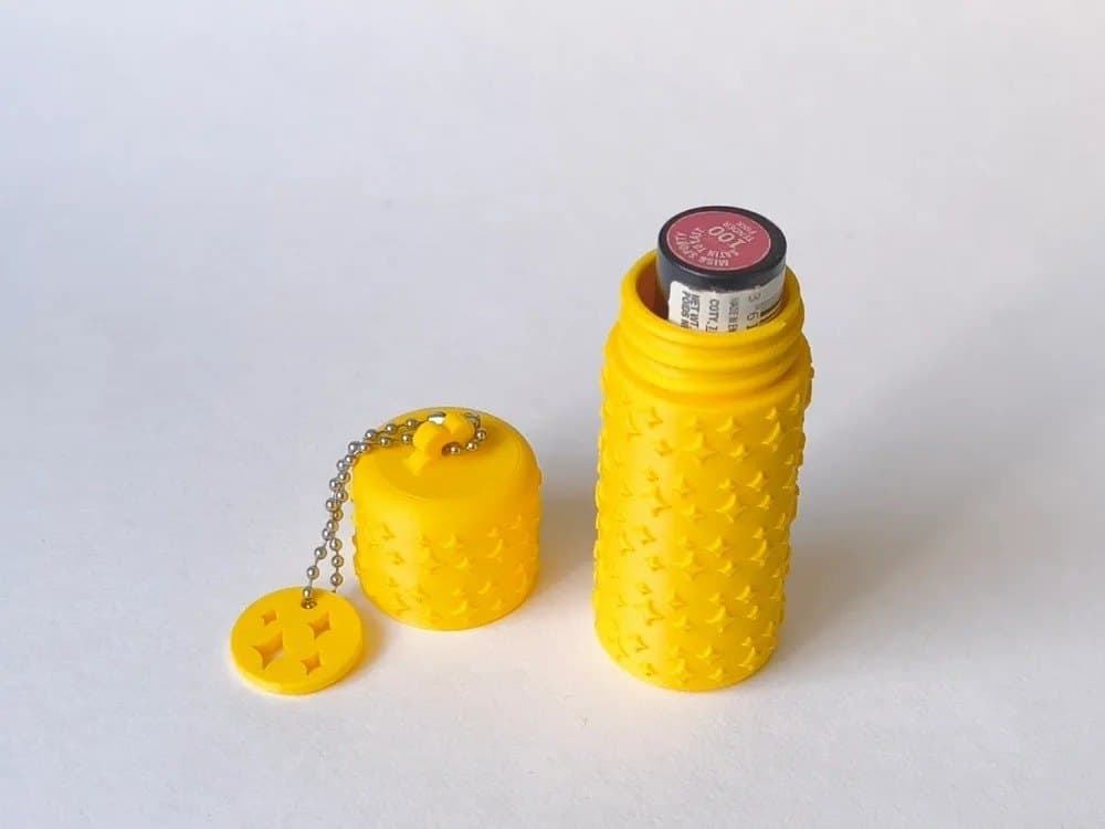 Lipstick Keychain Travel Kit - 5 Piece Refillable Toiletry Container Set with Cotton Pad Box, Cream Jar, Lip Balm Holder - Yellow Star Handbag Organiser — lit vs unlit view